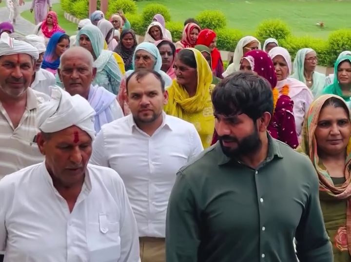 A public awareness campaign scene with people engaging in community outreach and civic participation